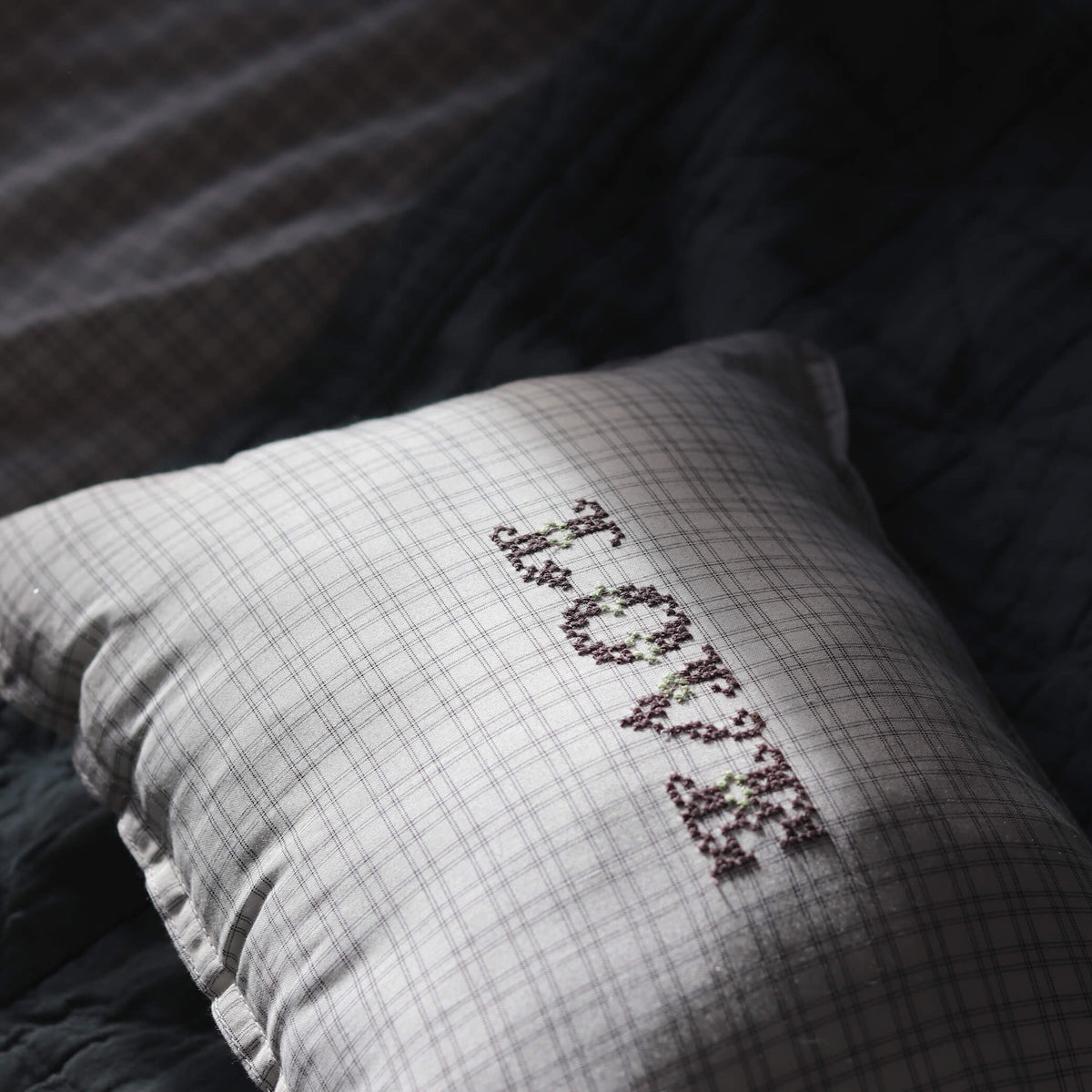 Camomile London grid check cushion