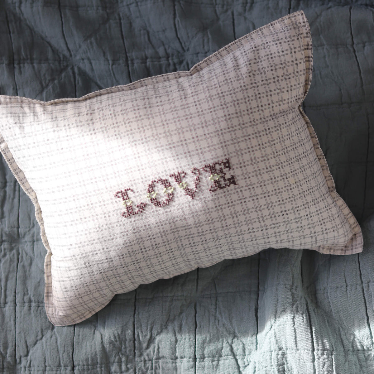 Camomile London grid check cushion