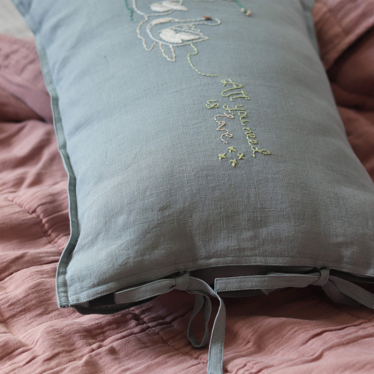 Camomile London swan embroidered cushion