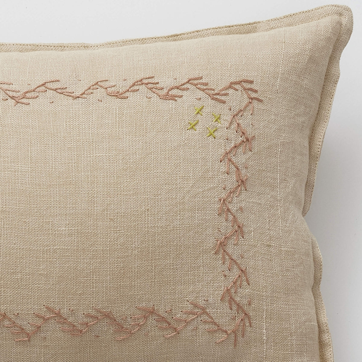 Camomile London hand embroidered zig zag cushion