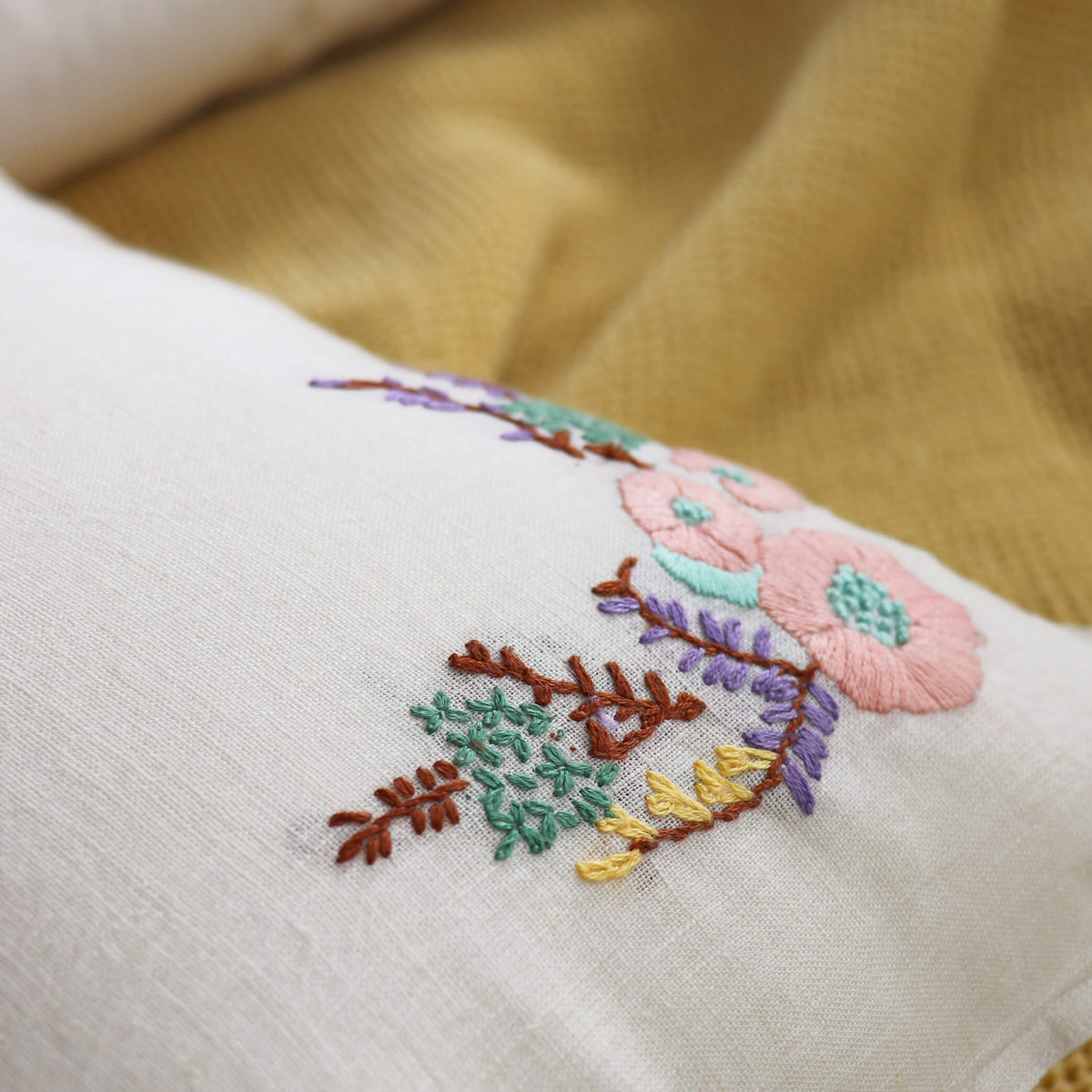 Camomile London embroidered pure linen cushion