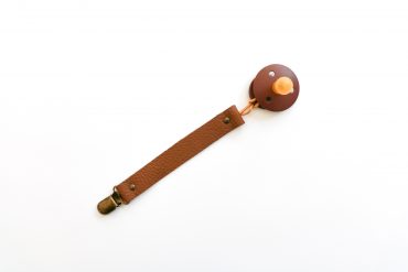 Genuine leather pacifier clip