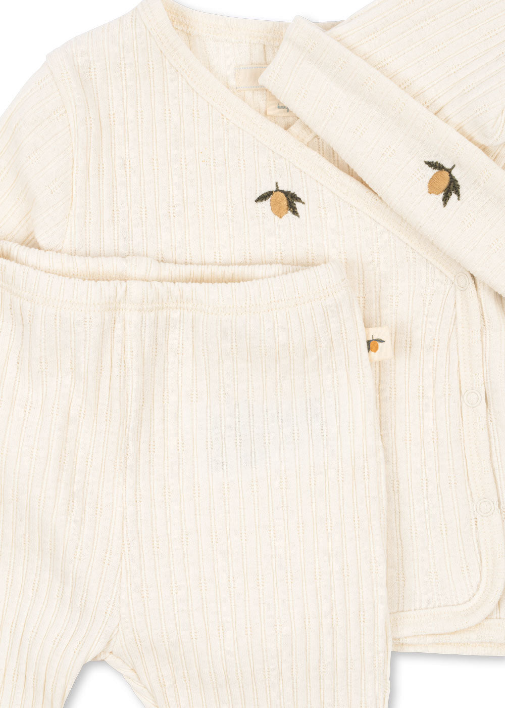 Konges Sloejd Nia Take Me Home newborn set in Lemon fabric detail