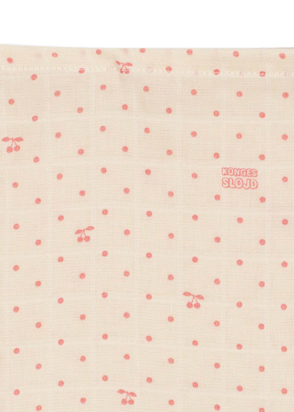 Close-up of Konges Sloejd Cherry Dot muslin fabric