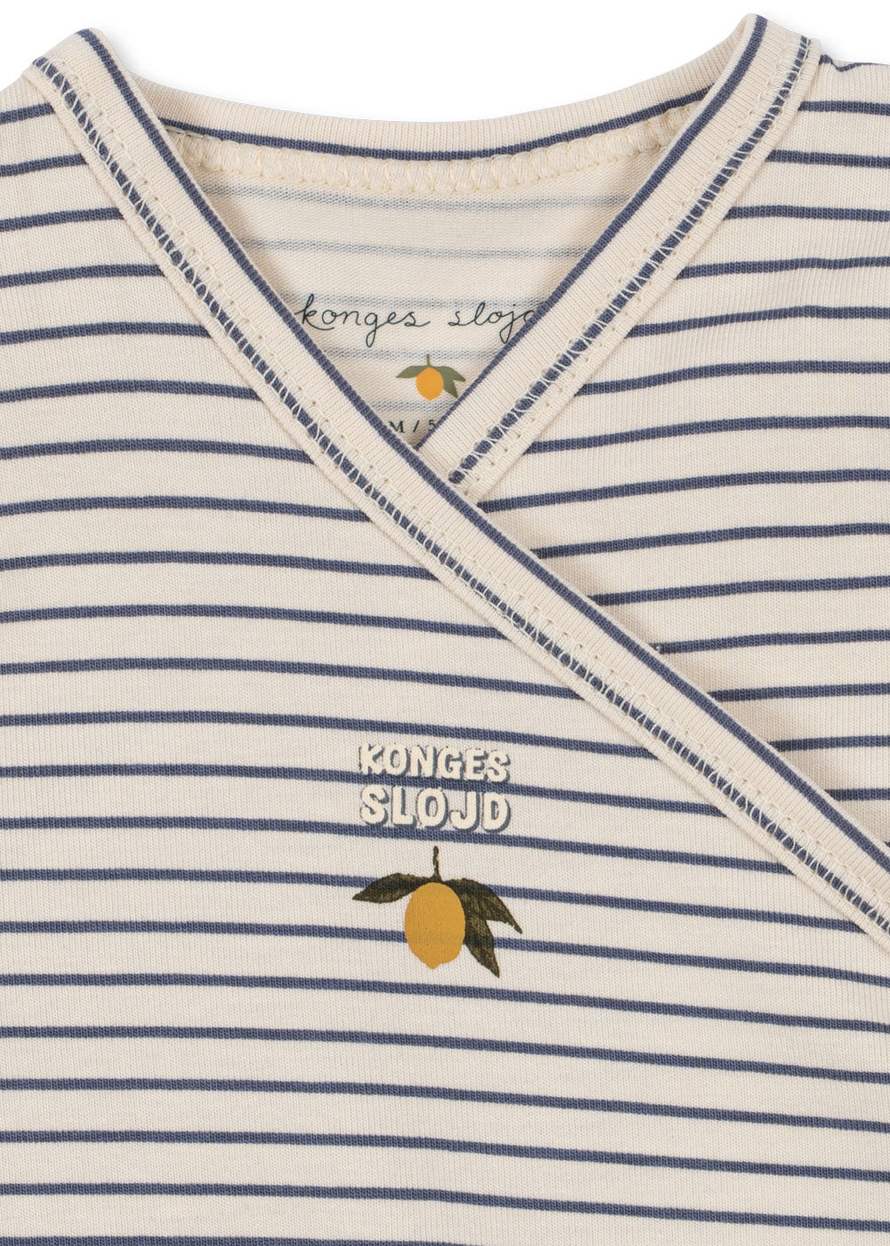 Close-up of Konges Sloejd Stripe Combo onesie neckline