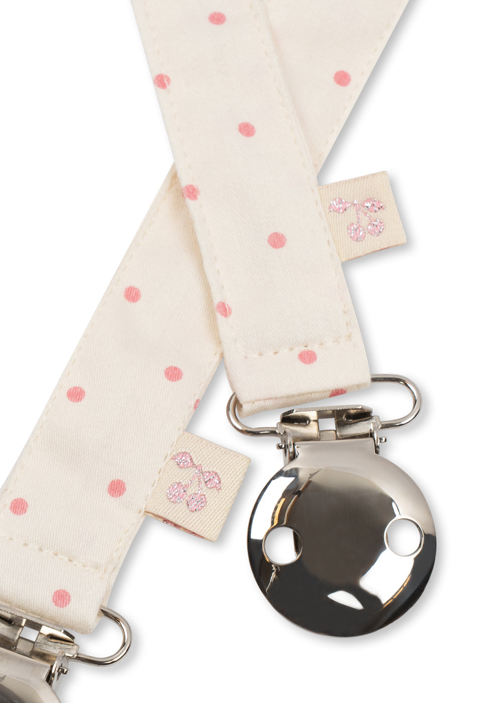 Close-up of Konges Sloejd Cherry Dot pacifier clip