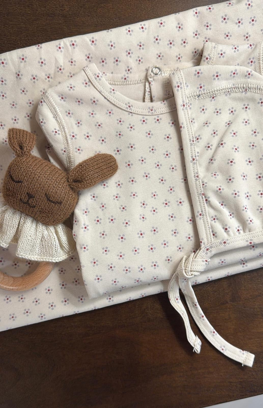 Lovely Littles Blue Roseberry romper and hat styled with blanket
