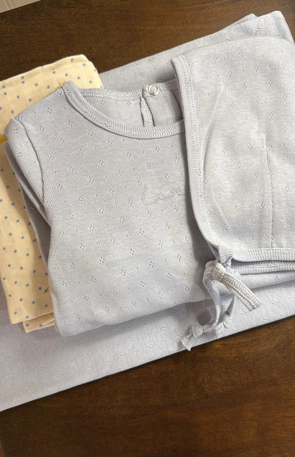 Lovely Littles Dew Drop Pointelle romper and hat styled with blanket