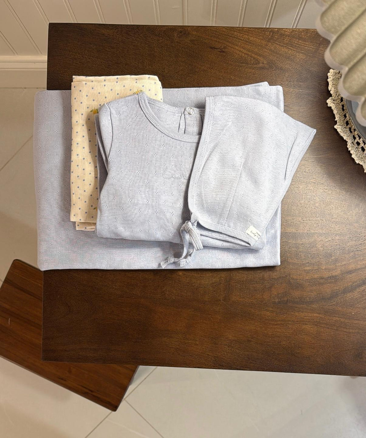Lovely Littles Dew Drop Pointelle Blanket styled with matching babywear