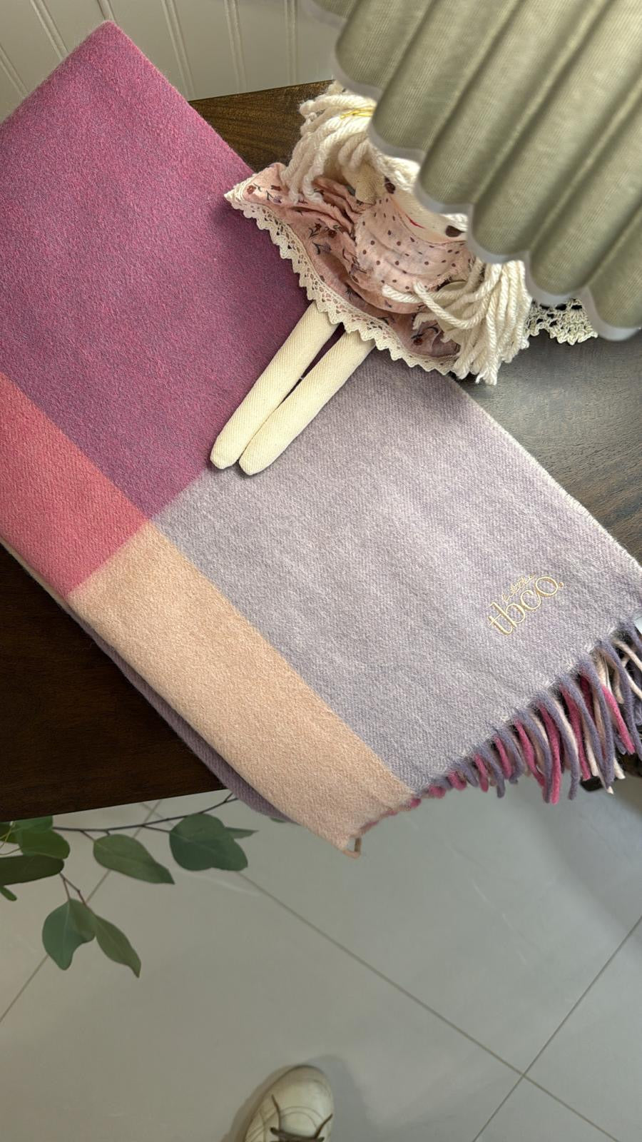 Close-up of TBco Pink Block Check baby blanket