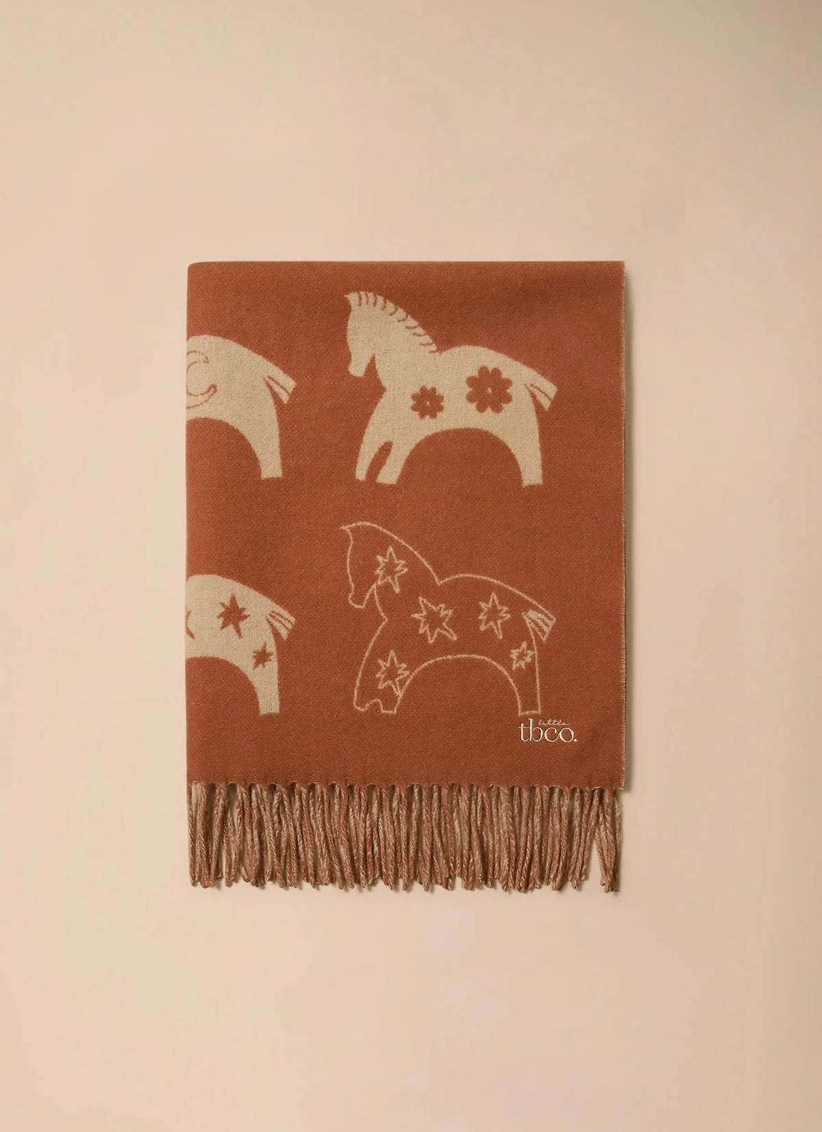 Folded TBco Rust Gallop lambswool baby blanket