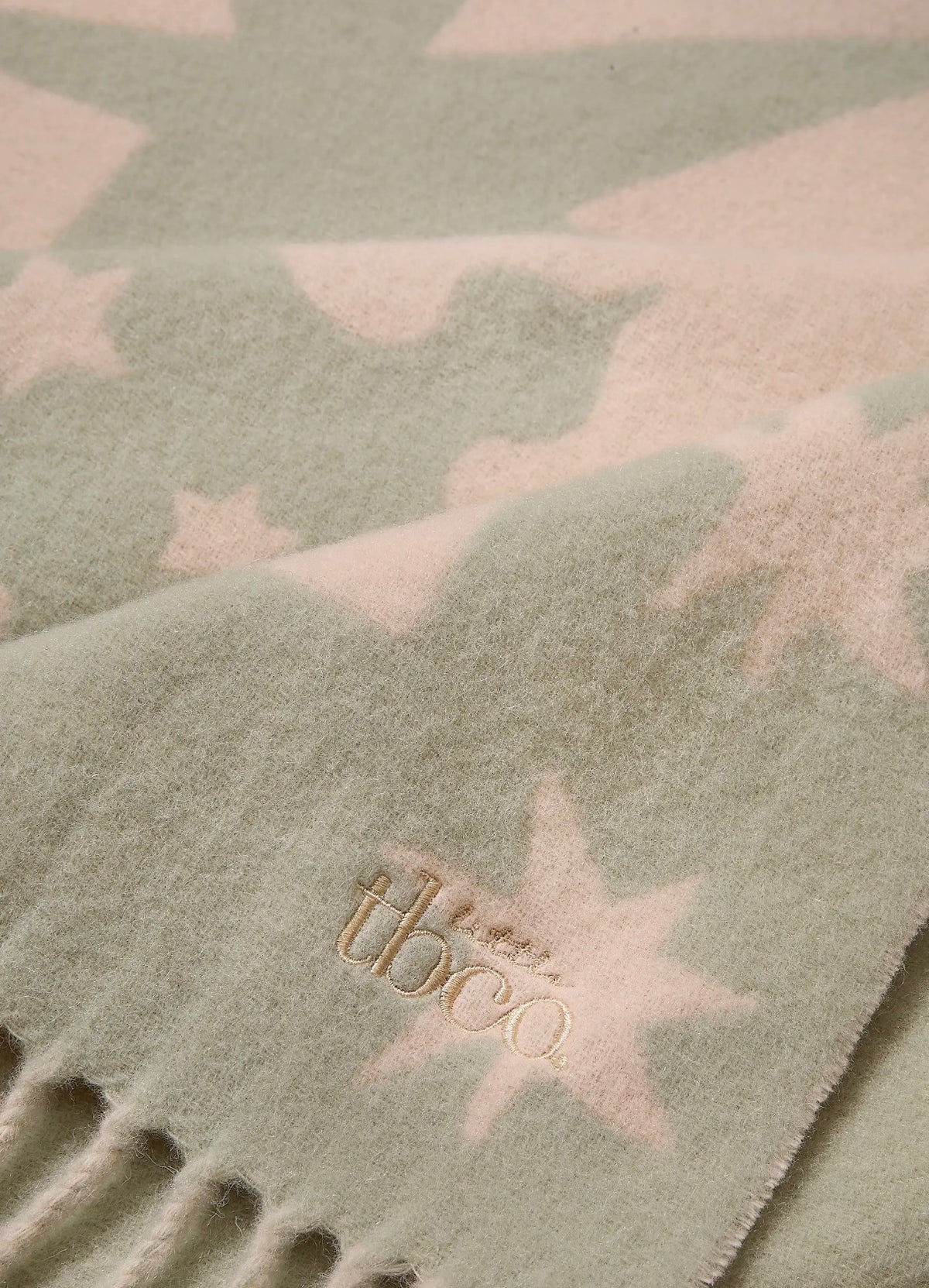 Close-up of TBco Sage Folk baby blanket